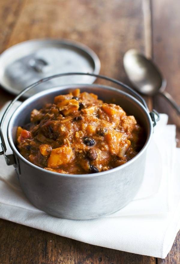Jalapeño Sweet Potato Chicken Chili in a bowl with a spoon.