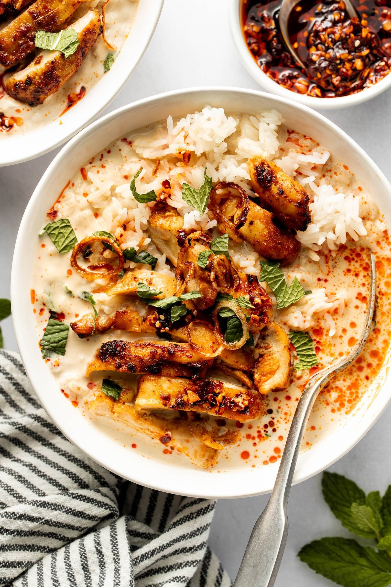 Lemongrass broth bowls with rice and chicken.