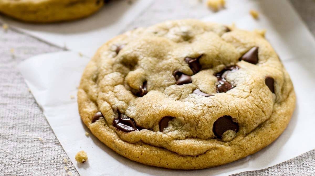 Chocolate Chip Cookies on parchment paper.
