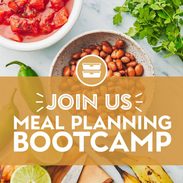 Meal prep happening on a counter with a cutting board and fresh ingredients.