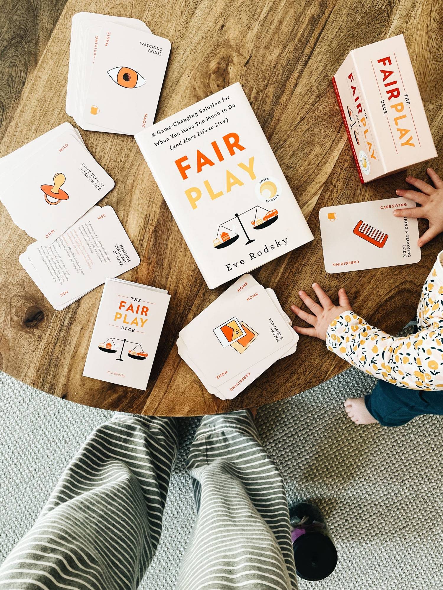 Table with cards and a book on it. 