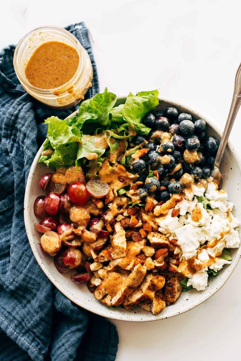 Rainbow chicken salad in a bowl.