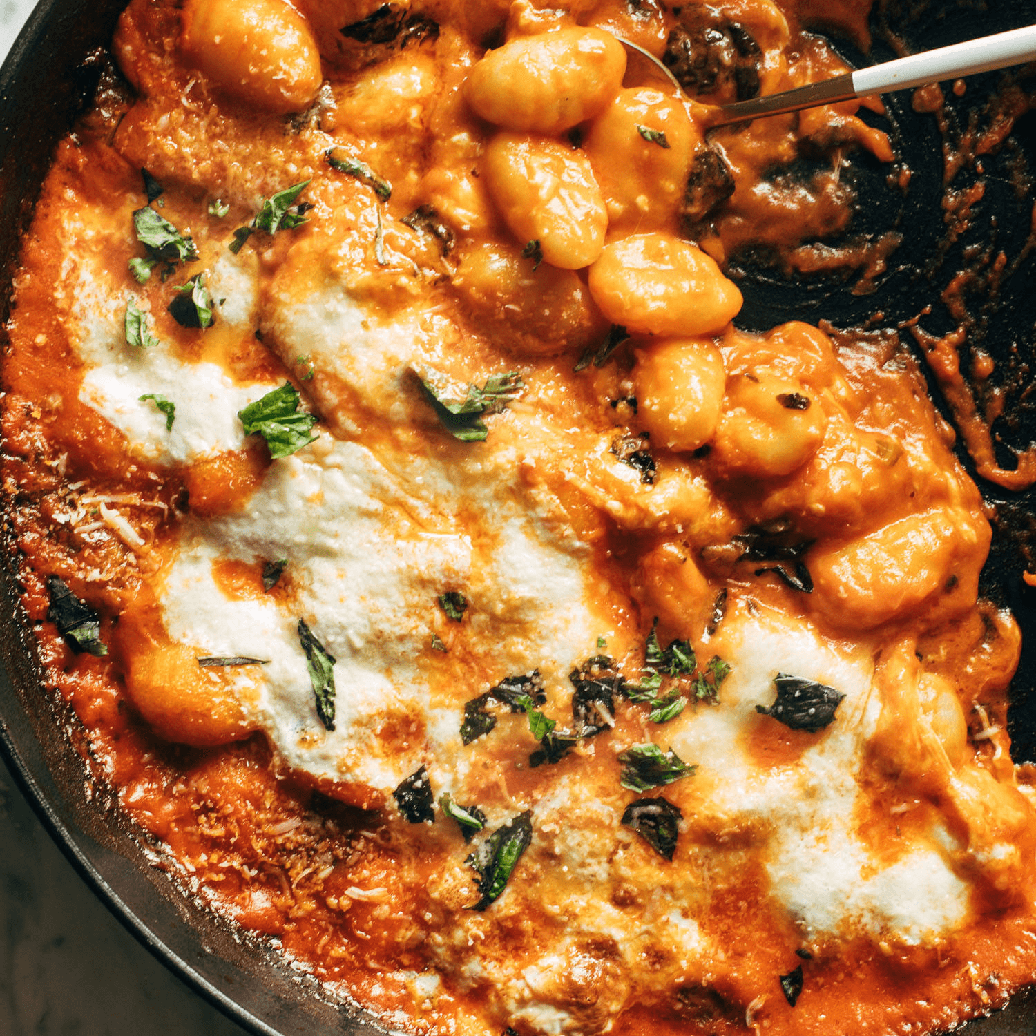 Three cheese gnocchi in a skillet.