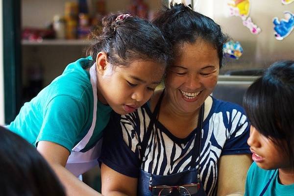 Woman with young girls.